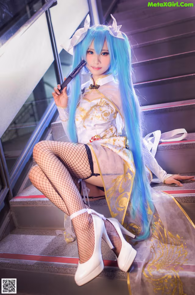 A woman with long blue hair sitting on some stairs.